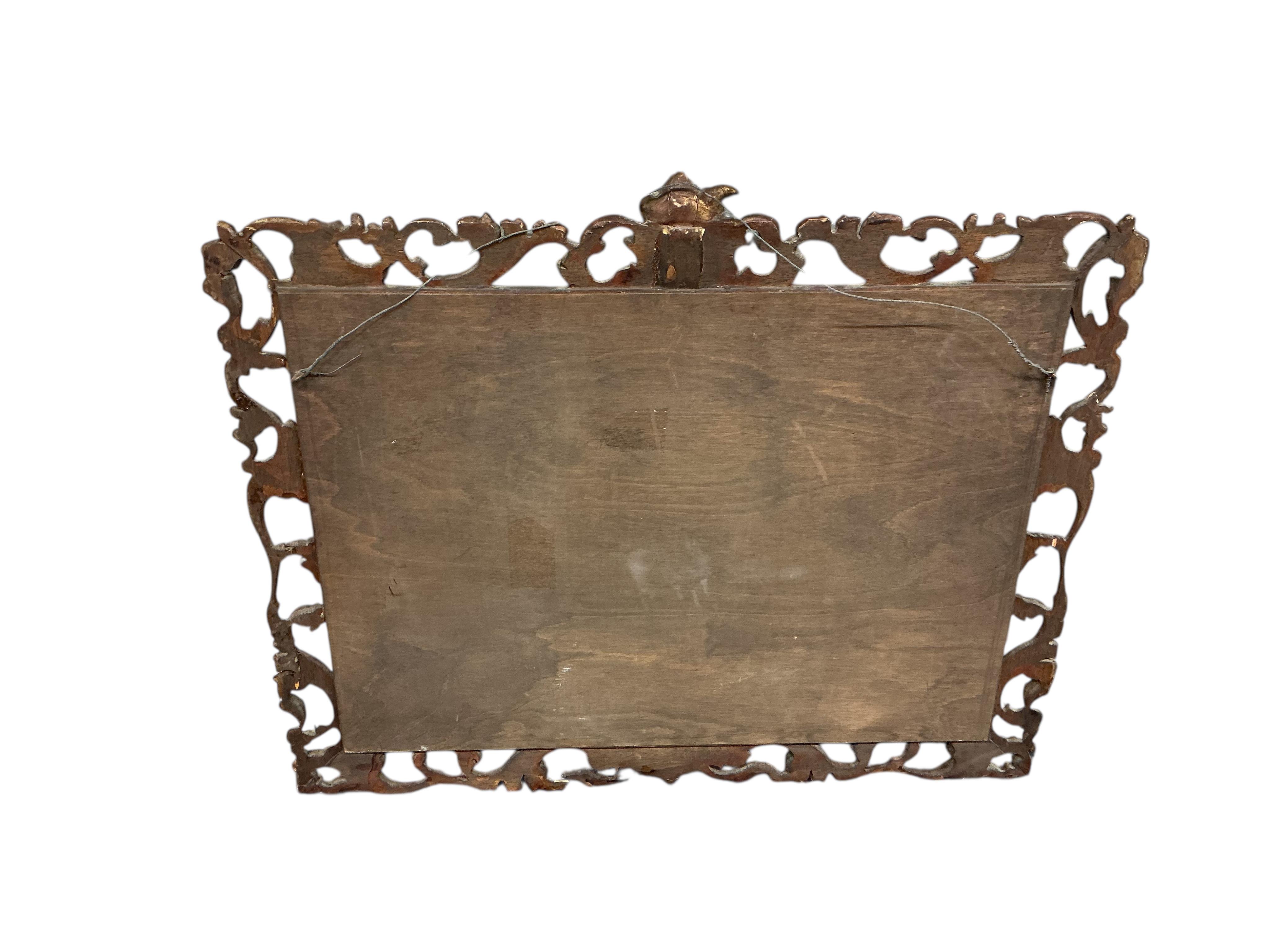 A giltwood mirror with openwork surround, width 88cm, height 70cm
